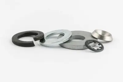 Rondelles plates, ressort, éventail et cuvette